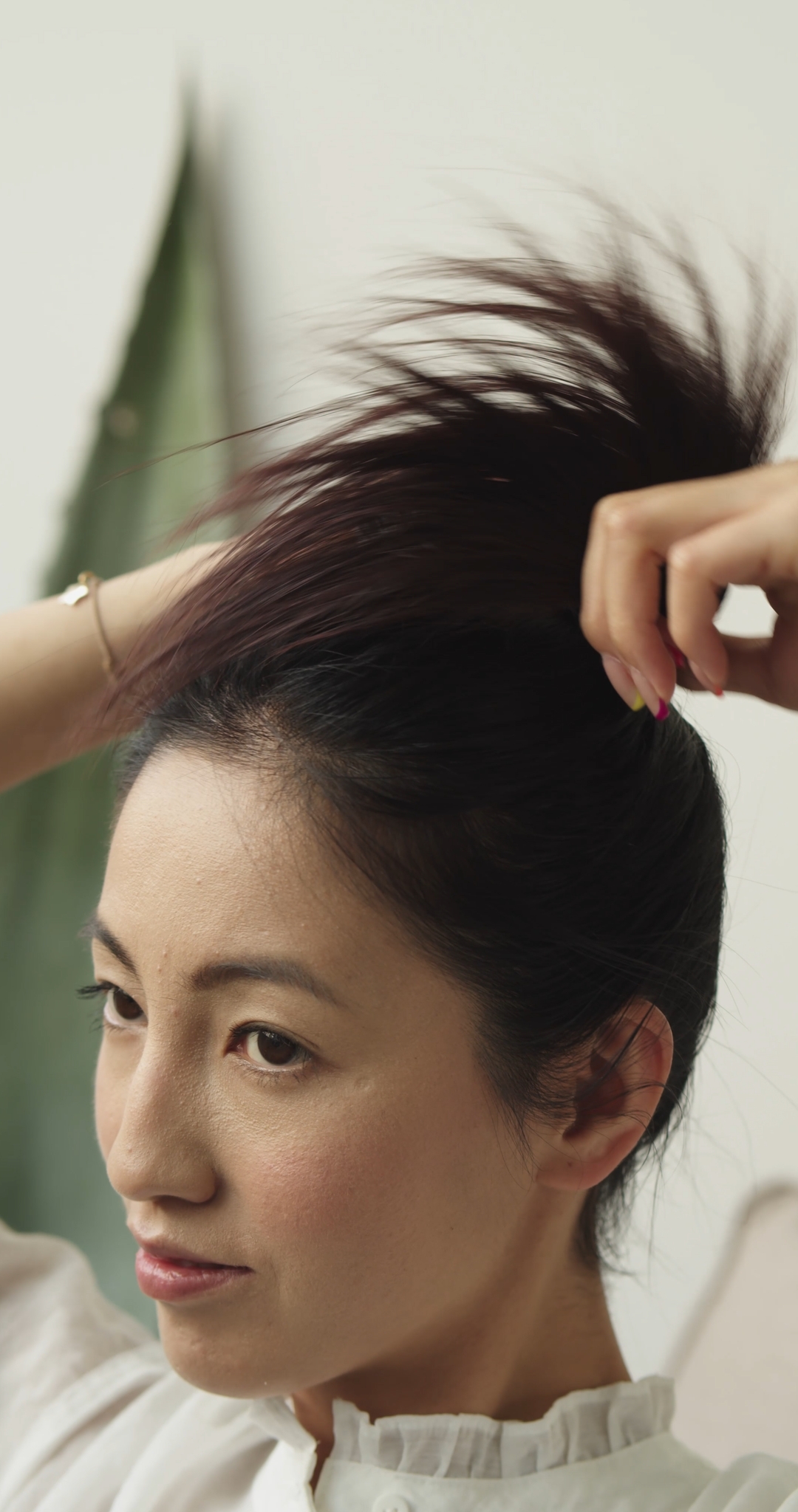Everyday Japandi Lifestyle - A Woman Tying Hair in a Bun 068 Woman Tying Hair in a Bun