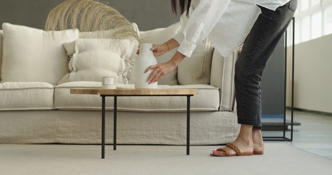 Everyday Japandi Lifestyle - A Woman in Sandals Placing Decorative Vase on the Table 041 Woman in Sandals Placing Decorative Vase on the Table