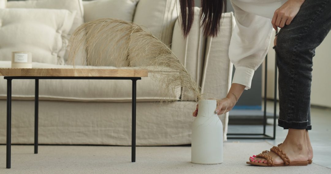 Everyday Japandi Lifestyle - A Woman With Pink Pedicure Placing Decorative Vase next to the Table 043 A Woman With Pink Pedicure Placing Decorative Vase next to the Table